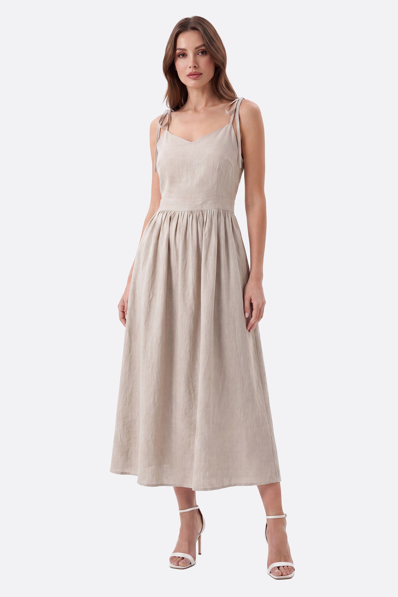 Ropa midi beige con espalda descubierta y tirantes anudados