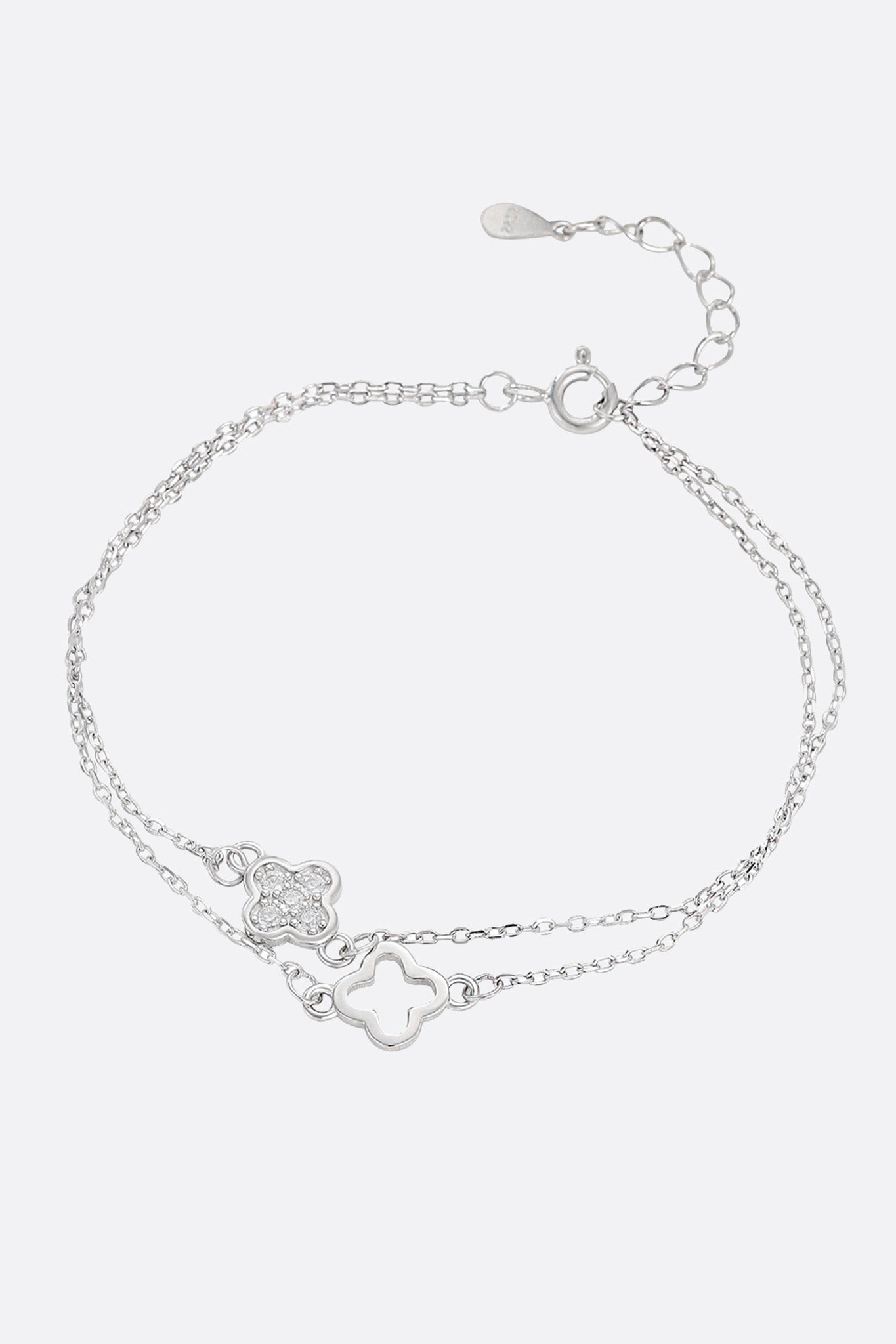 Pulsera de doble cadena en plata 925 con motivo de trébol y zirconia