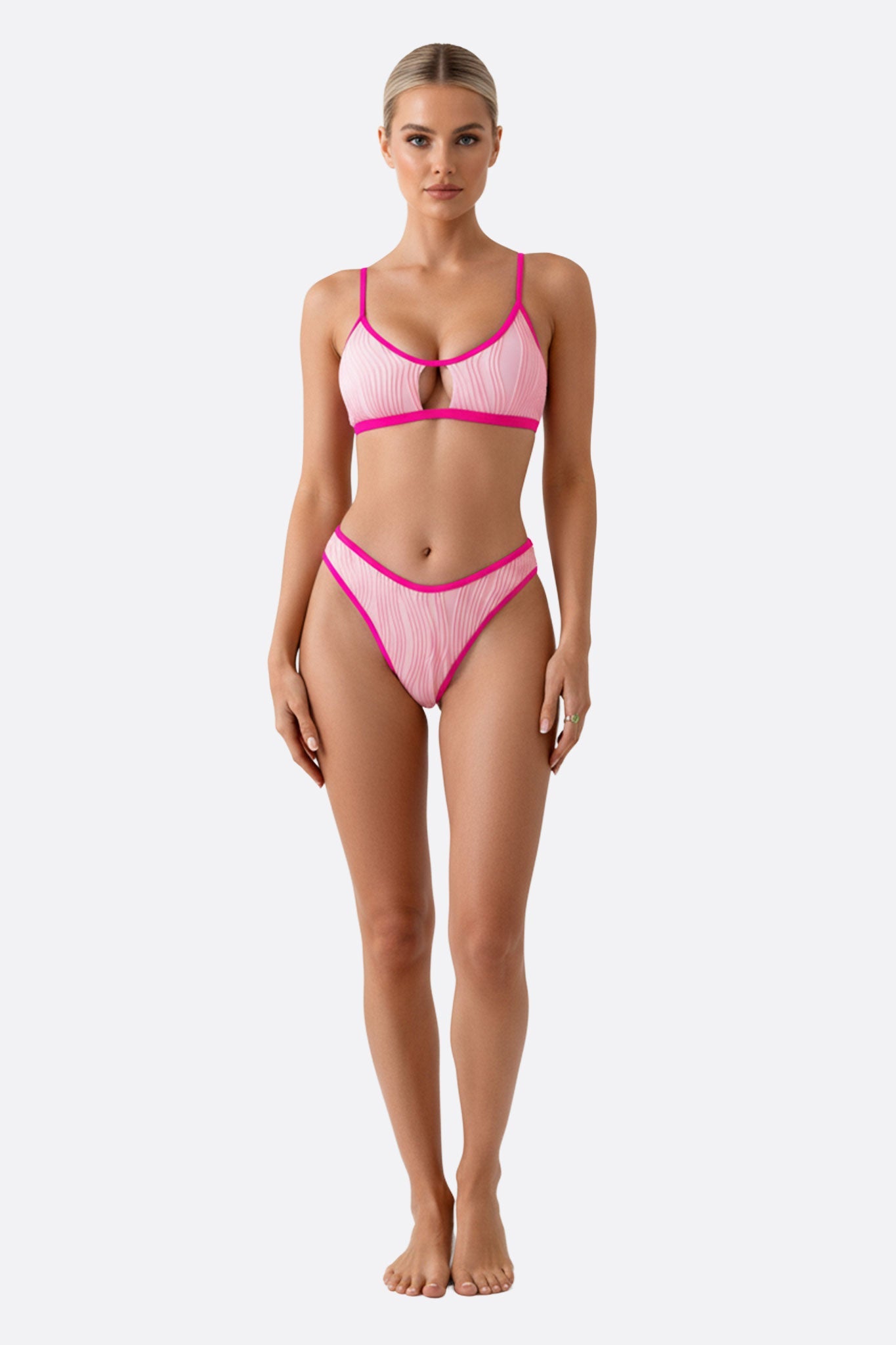 Bañador de dos piezas rosa con ribete fucsia