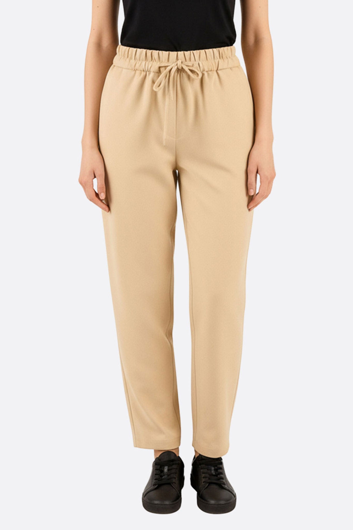 Pantalón beige casual con cintura elástica