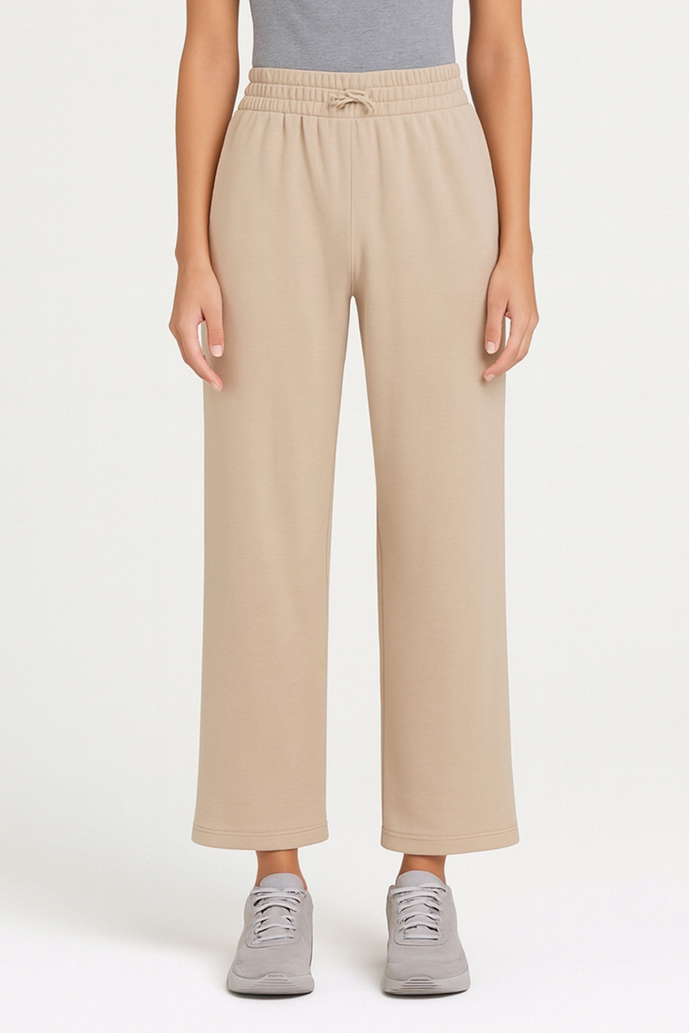 Pantalón ancho beige en tejido técnico de corte 7/8