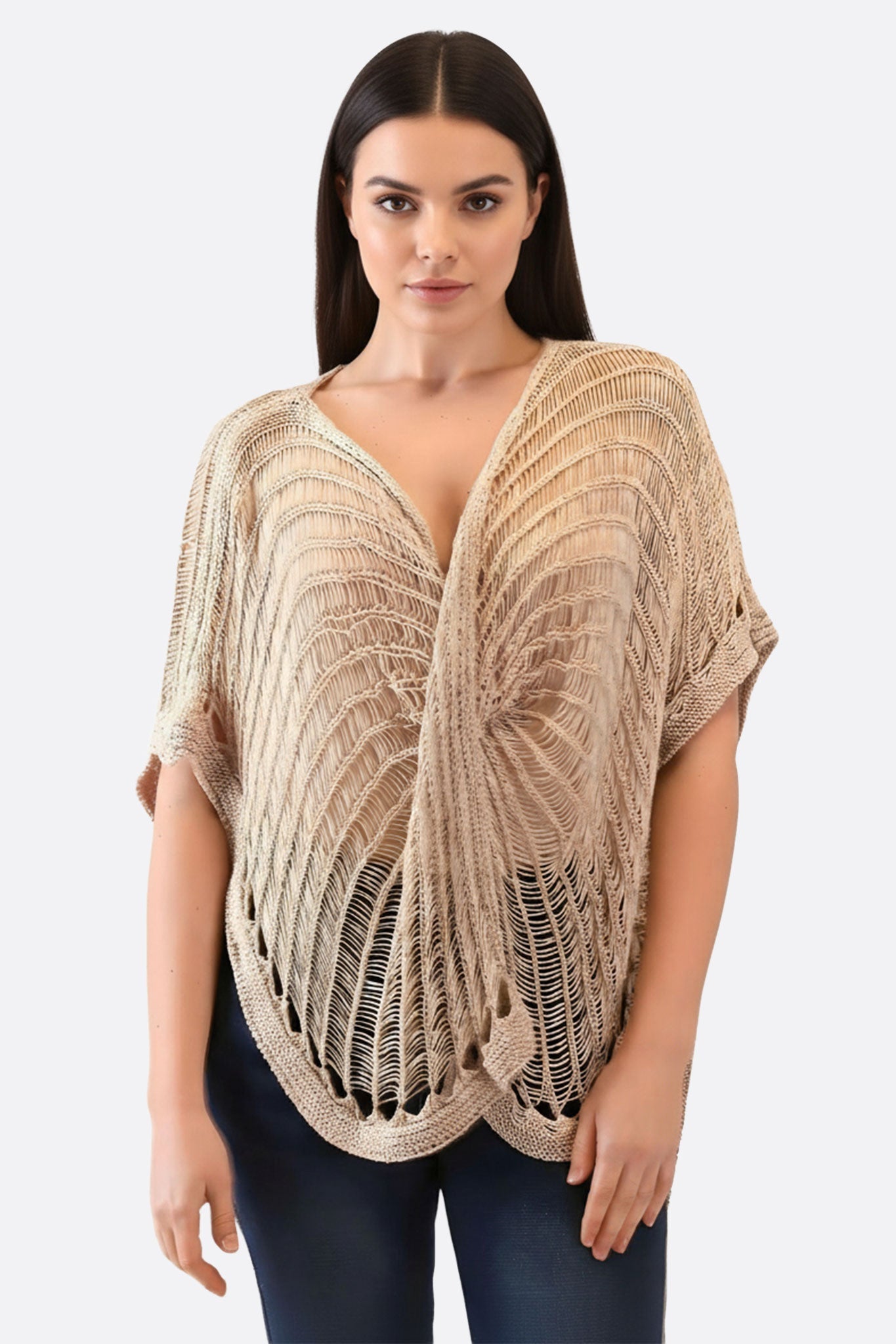 Poncho bohemio beige en malla calada