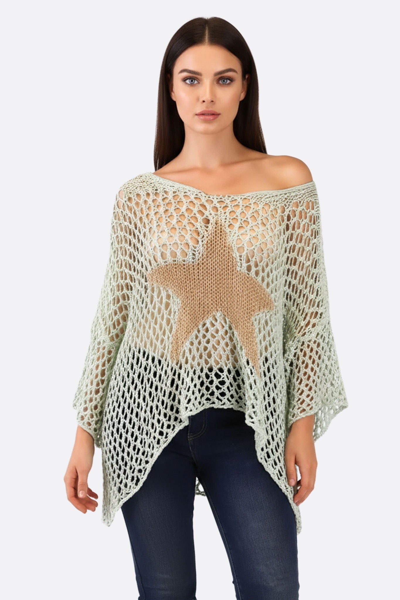 Poncho turquesa de punto calado con motivo de estrella