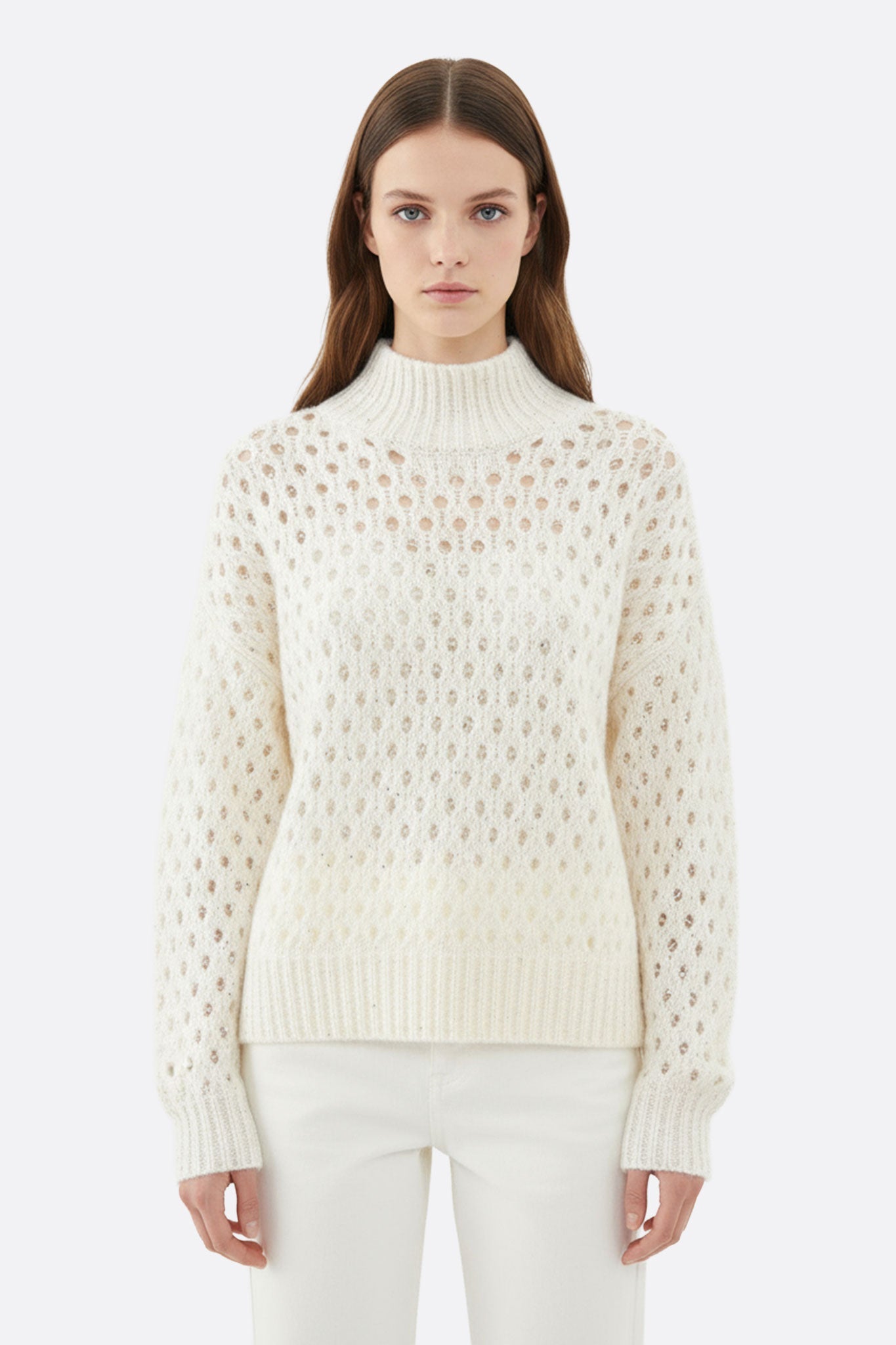 Jersey blanco calado de cachemira con cuello alto y lentejuelas